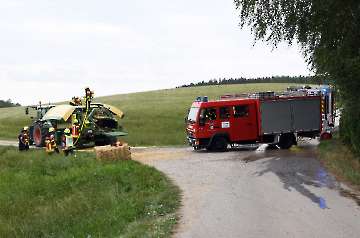 Brennende Ballenpresse